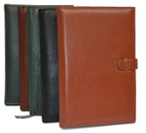 black, green, tan and camel colored leather journals