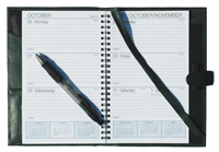 inside view of green leather Forever planner with weekly calendar